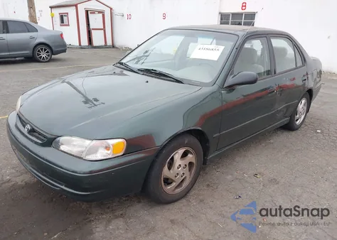 2000 Toyota Corolla Le from USA, damaged, VIN 1NXBR18E3YZ305285